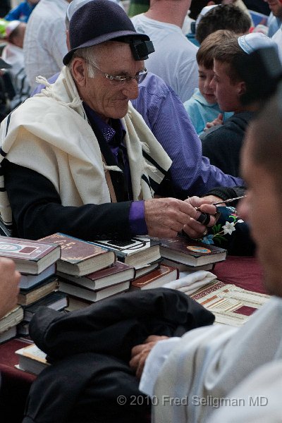 20100408_104200 D300.jpg - Jew in prayer.  The box on his forehead is called head-tefillin which contain scrolls of parchment inscribed with verses from the Torah.  A box and leather straps is also worn on the left hand (side closest to the heart)